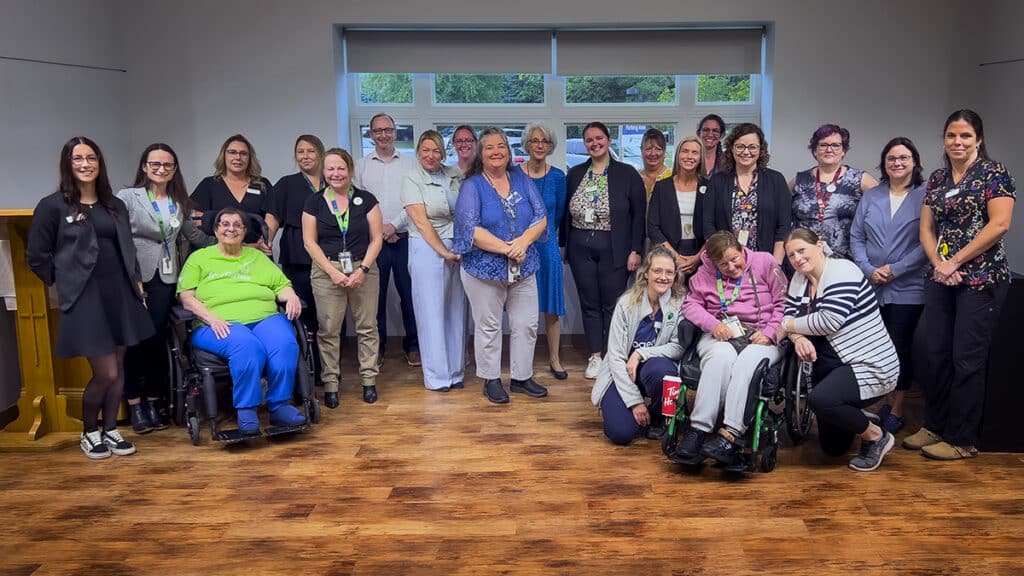 Fairmount Home staff and residents and Frontenac County staff with CARF accreditation surveyors at Fairmount Home, September 25.