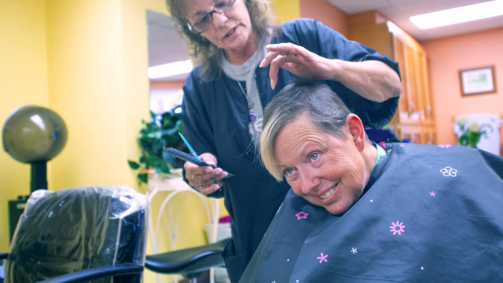 Fairmount Home resident recieving a haircut. 