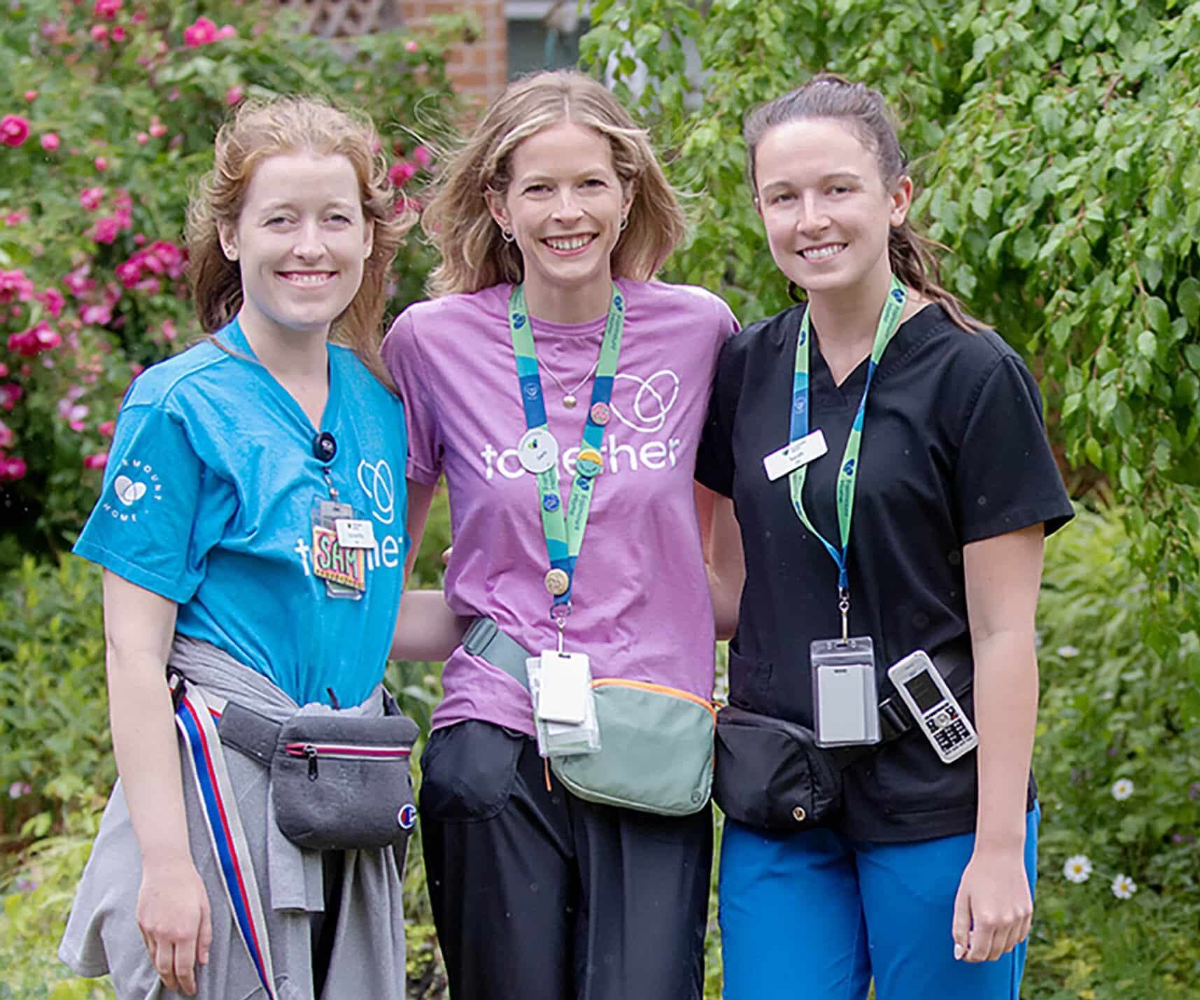 Three Fairmount Home nurses smiling for the camera.
